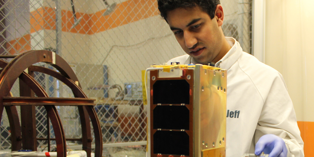 Dr Rahul Rughani working on some device