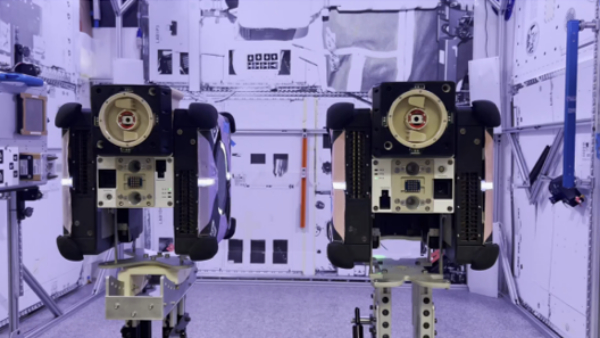 Two cube satellites inside the International Space Station