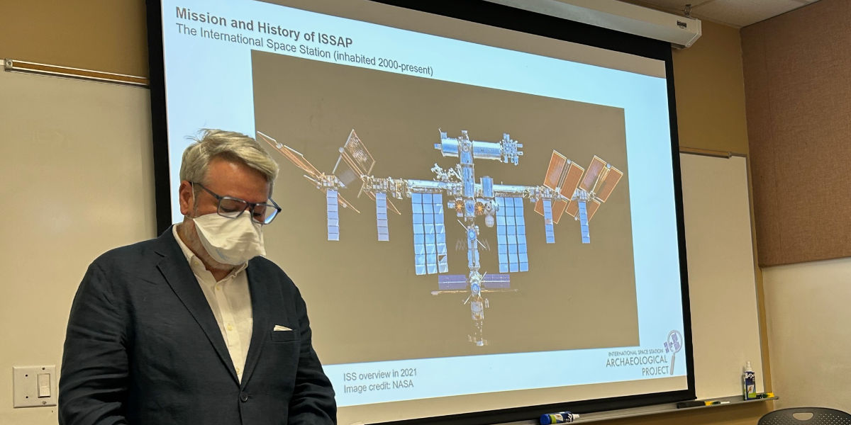 Person presenting slide about the internation space station