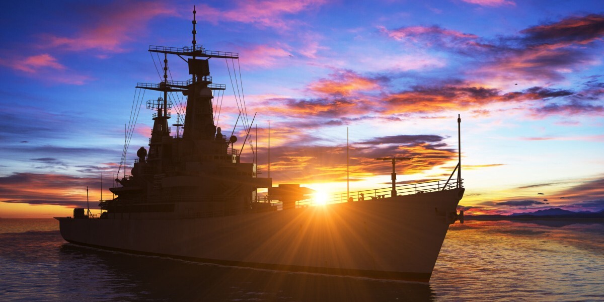 US Navy Ship during Sunrise