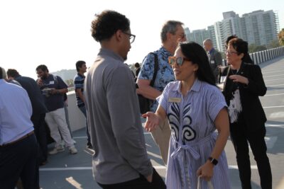 Guests chatting on the rooftop