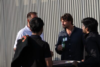 Guest drinking a beer