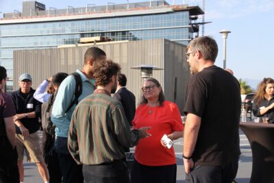Yolanda Gil mingling with guests