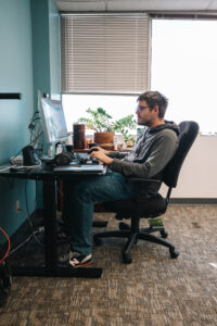 Researcher working on computer