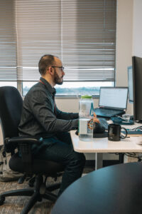 Researcher working on computer