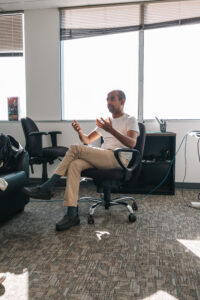Person seated on office chair