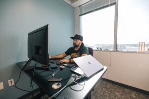 Researcher working on computer