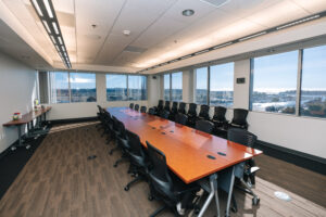Modern office interior with seating and workspaces