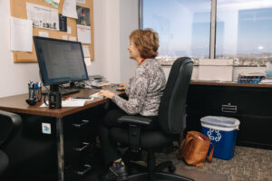 Researcher working on computer