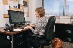Researcher working on computer