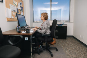 Researcher working on computer