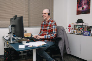 Researcher working on computer