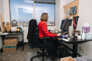 Researcher working on computer