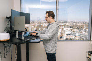 Researcher working on computer