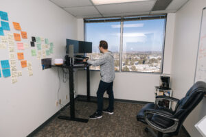 Researcher working on computer